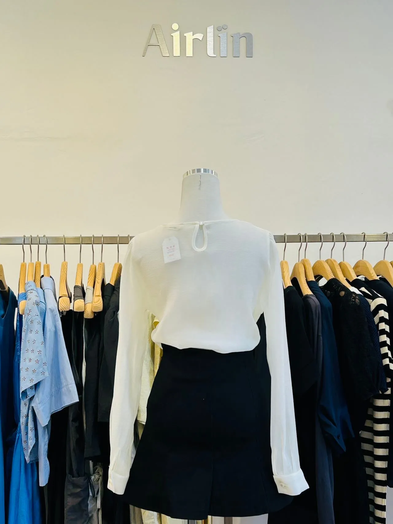 White/grey sheer bow blouse
